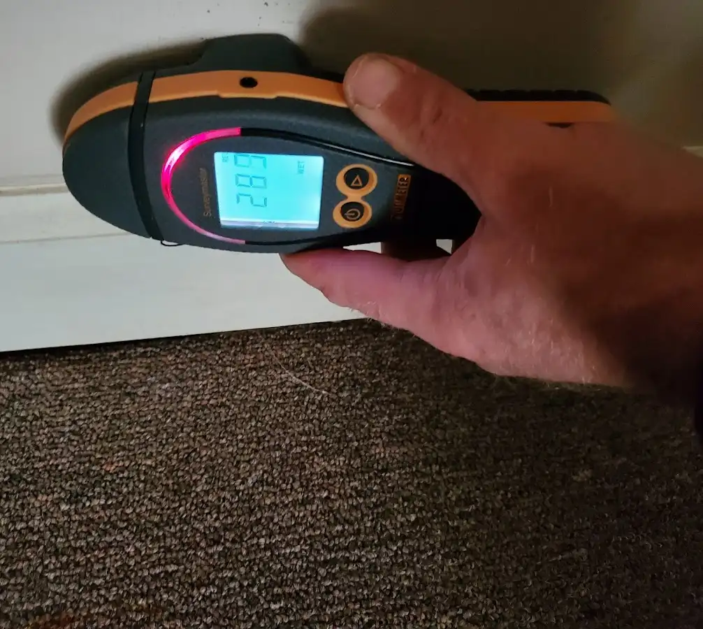 Moisture detection at baseboard during Burst Pipe Cleanup in Park City